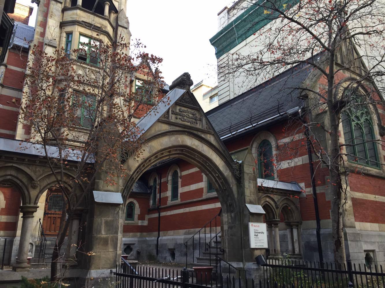 University Hall, an old church made of red bricks in a fancy style.